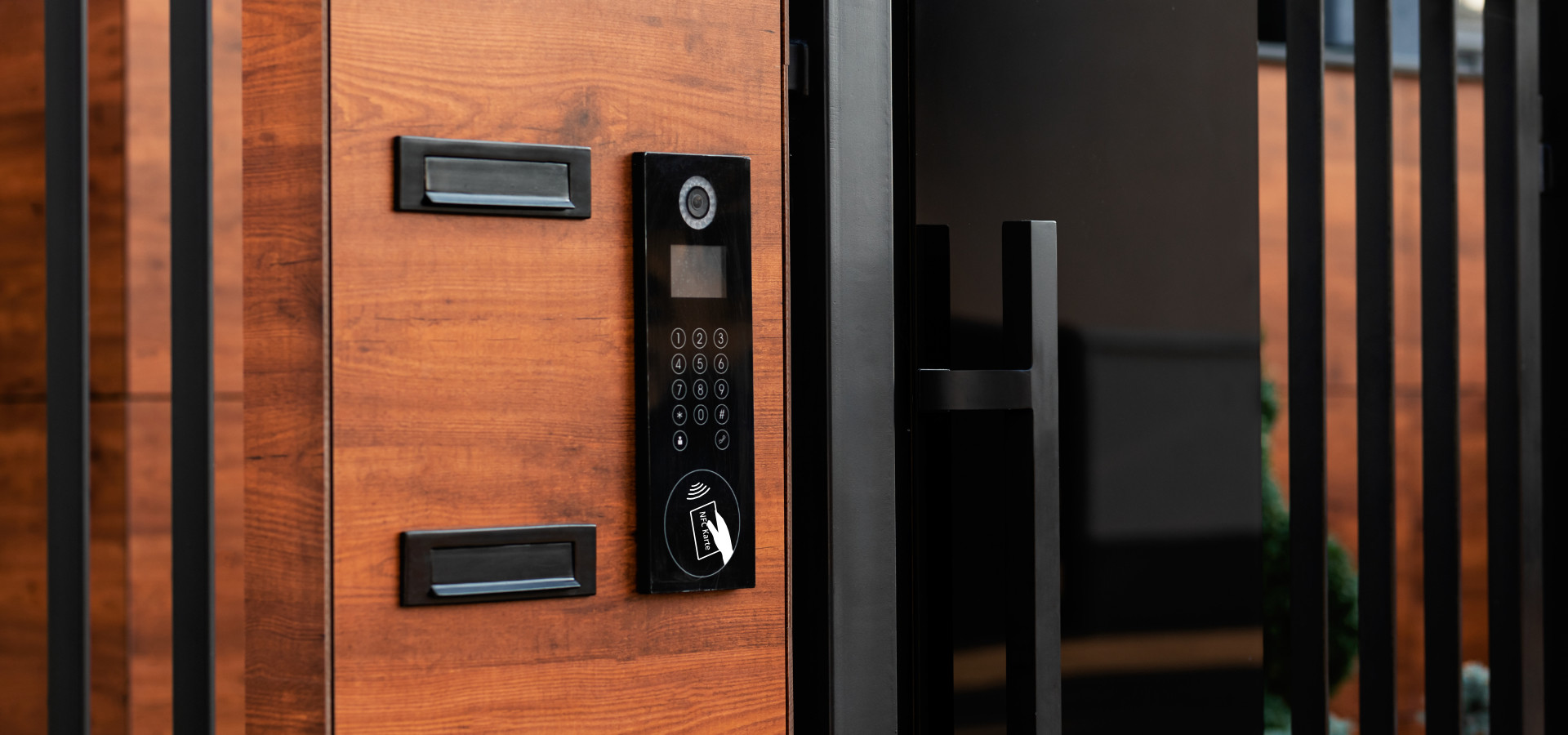 Wooden door with modern intercom with NFC function