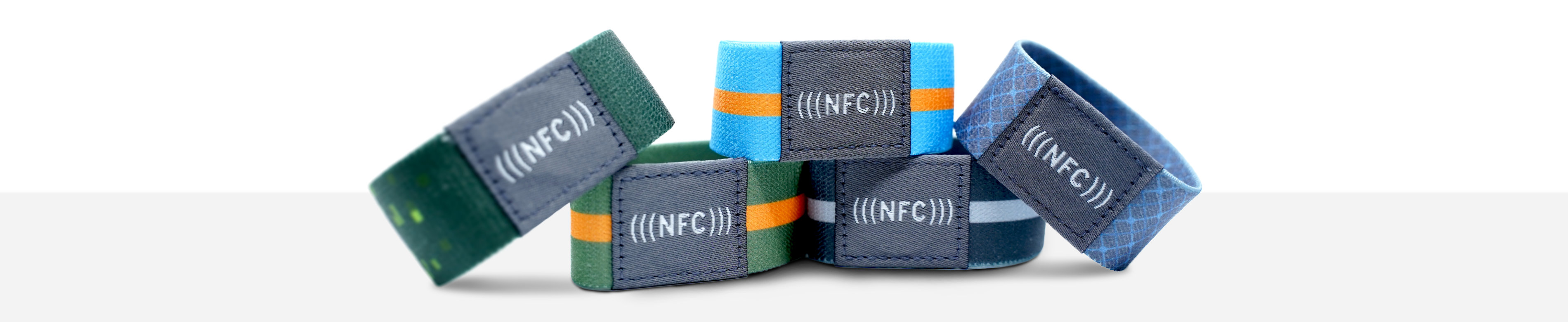  Fabric NFC wristbands in stacked in different colours