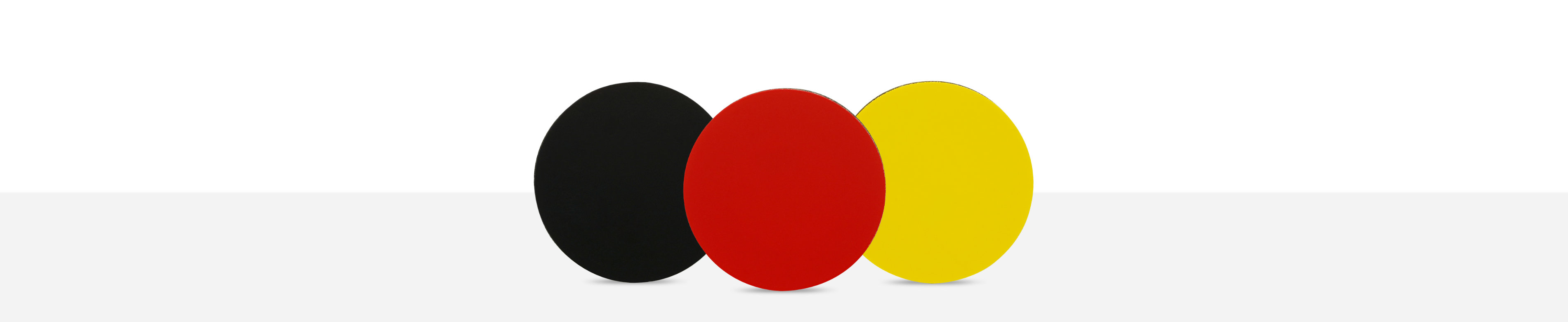 Industry PVC coins in black, red and yellow